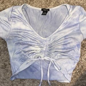 Because it’s to small it’s a baby blue with white marble print